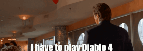 A Man In A Suit Says I Have To Play Diablo 4 In A Restaurant GIF