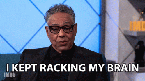 a man in a suit says i kept racking my brain