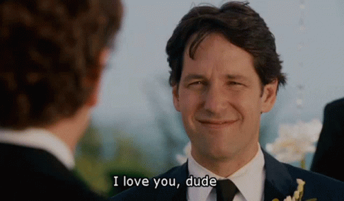 A Man In A Suit Says I Love You Dude To Another Man GIF
