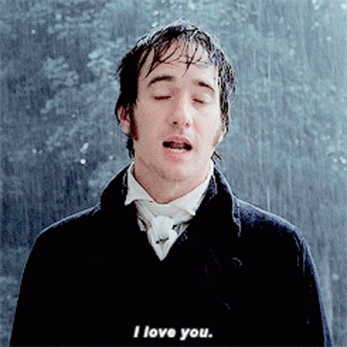 A Man In A Suit Says I Love You In The Rain GIF