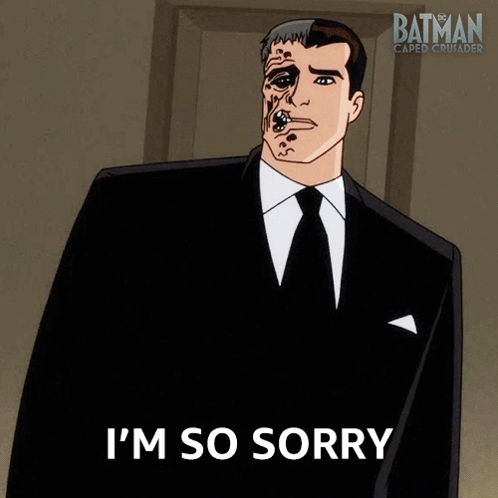 A Man In A Suit Says I 'M So Sorry In Front Of A Batman Logo GIF