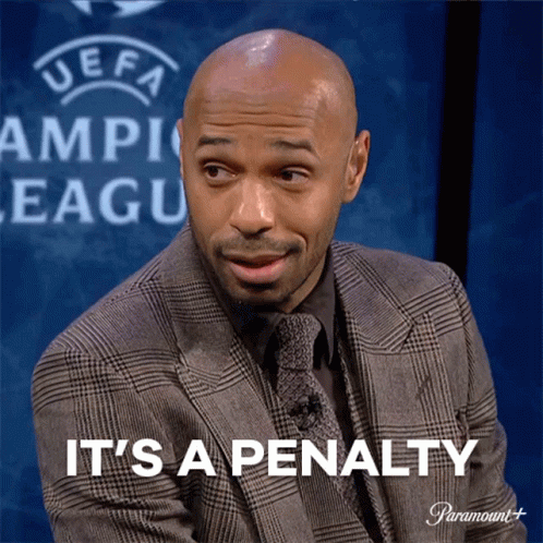 A Man In A Suit Says It 'S A Penalty In Front Of A Uefa Logo GIF