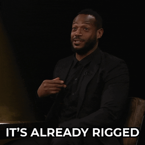 a man in a suit says it 's already rigged with his hands