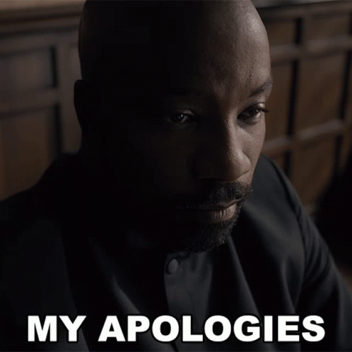 Man In Suit Saying My Apologies GIF