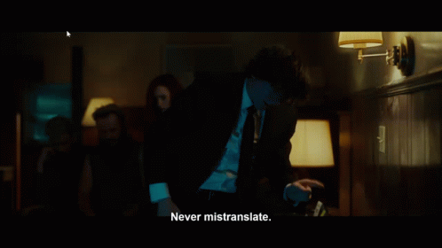 A Man In A Suit Says " Never Mistranslate " GIF