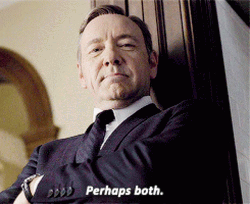 A Man In A Suit Says Perhaps Both GIF