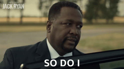 A Man In A Suit Says So Do I While Looking Out Of A Car Window GIF