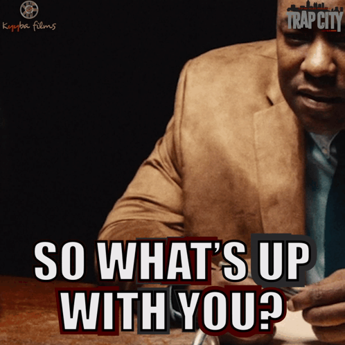 A Man In A Suit Says " So What 'S Up With You ? " GIF