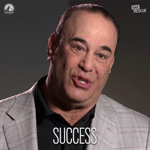 Man In Suit Saying Success GIF