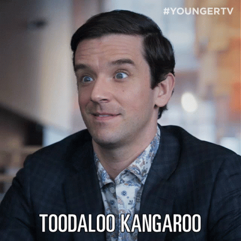 A Man In A Suit Says " Toodaloo Kangaroo " On A Screen GIF