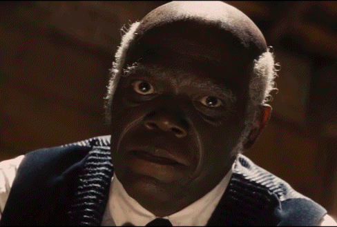 A Man In A Suit Says Until Your Back Give Out On His Face GIF