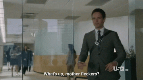 A Man In A Suit Says What 'S Up Mother Flickers GIF