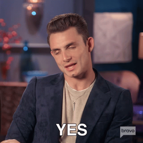 A Man In A Suit Says Yes On Bravo Tv GIF