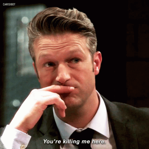 A Man In A Suit Says You 'Re Killing Me Here GIF