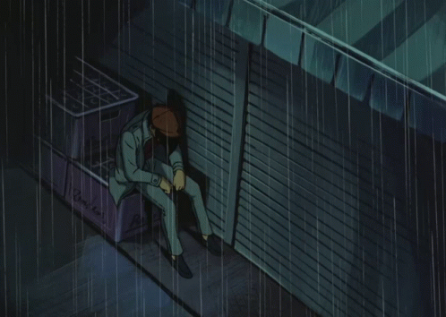 Man In Suit Sitting In Rain Next To Recycle Bin GIF