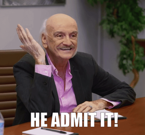 Man In Suit Sitting At Table Saying He Admit It GIF
