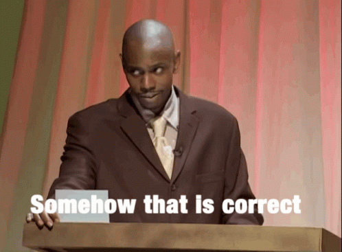 A Man In A Suit Stands At A Podium With The Words Somehow That Is Correct GIF