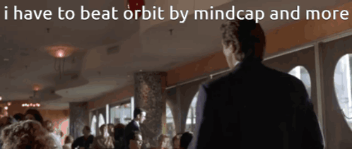 A Man In A Suit Stands In Front Of A Crowd Of People With The Words I Have To Beat Orbit By Mindcap And More GIF