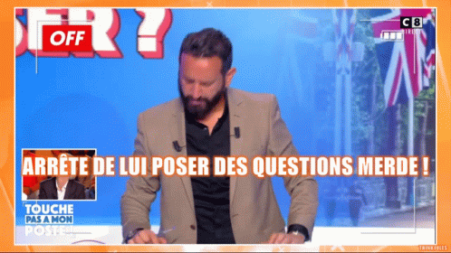 A Man In A Suit Stands In Front Of A Screen That Says " Off " GIF