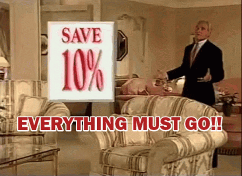 A Man In A Suit Stands In Front Of A Sign That Says " Save 10 % " GIF