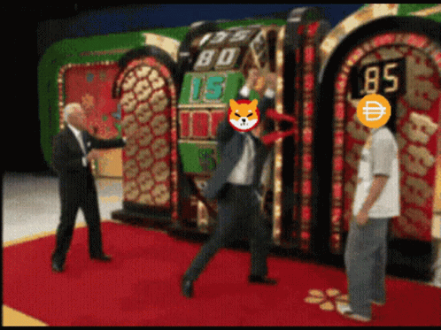 A Man In A Suit Stands In Front Of A Slot Machine With The Number 85 On It GIF
