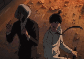 A Man In A Suit Stands Next To Another Man In A White Shirt GIF