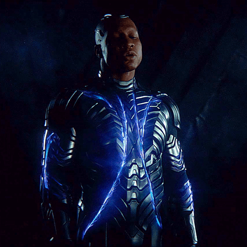 A Man In A Suit With A Blue Light Coming Out Of It GIF