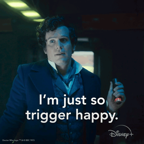 A Man In A Suit With The Words I 'M Just So Trigger Happy On The Bottom GIF