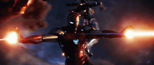 A Man In A Superhero Costume Is Flying Through The Air GIF