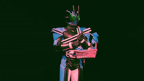 A Man In A Superhero Costume Is Holding A Basket Of Candy . GIF