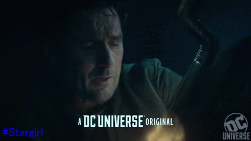 A Man In A Superhero Costume Is Laying On The Ground GIF