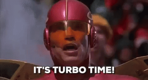 a man in a superhero costume is saying `` it 's turbo time ! ''