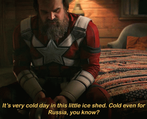 Superhero Sitting On Bed Saying Very Cold Day GIF