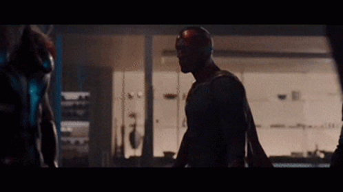 Superhero Talking To Another Man GIF
