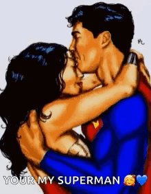 A Man In A Superman Suit Is Hugging A Woman In A Wonder Woman Costume . GIF