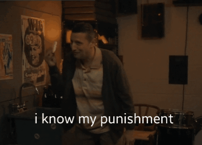 A Man In A Sweater Holds A White Object In His Hand And Says " I Know My Punishment " GIF