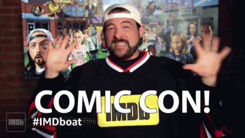 A Man In A Sweater That Says Comic Con GIF
