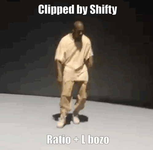 A Man In A Tan Shirt And Khaki Pants Is Dancing On A White Floor . GIF