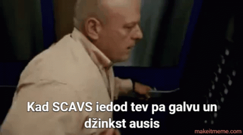A Man In A Tan Shirt Says Kad Scavs Iedod Tev Pa Galvu Un Dzinkst Ausis GIF