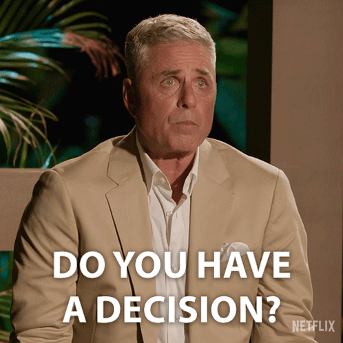 a man in a tan suit is asking if he has a decision