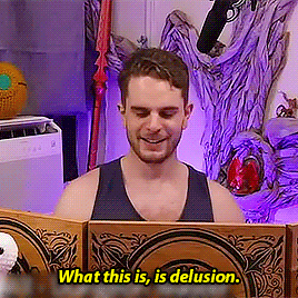 A Man In A Tank Top Is Reading A Book With The Words What This Is Is Delusion Below Him GIF
