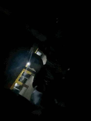 A Man In A Tank Top That Says ' Levis ' On It GIF