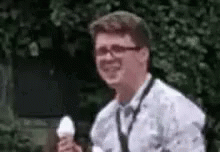 Man In Tie Holding Ice Cream Cone GIF