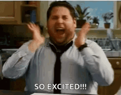 A Man In A Tie Is Making A Funny Face And Saying `` So Excited ! '' GIF