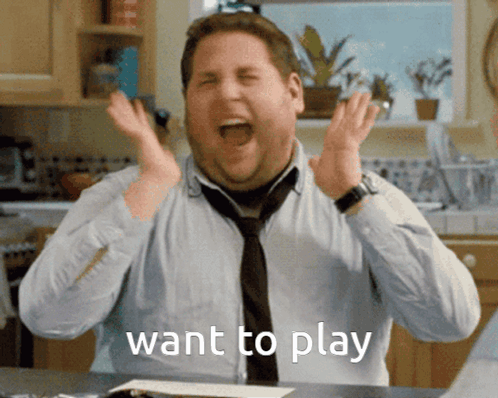 A Man In A Tie Is Making A Funny Face With The Words Want To Play Below Him GIF