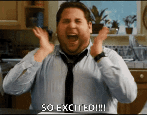 A Man In A Tie Is Screaming With The Words So Excited GIF