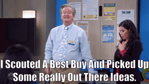 A Man In A Tie Is Standing Next To A Woman With The Words I Scouted A Best Buy GIF
