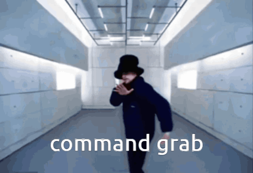 A Man In A Top Hat Is Dancing In A Hallway With The Words Command Grab Written In White GIF