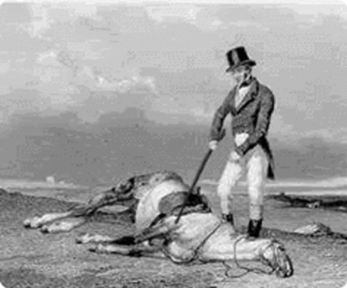 A Man In A Top Hat Is Standing Next To A Dead Horse In A Field . GIF