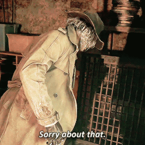 A Man In A Trench Coat And Cowboy Hat Is Saying Sorry About That GIF